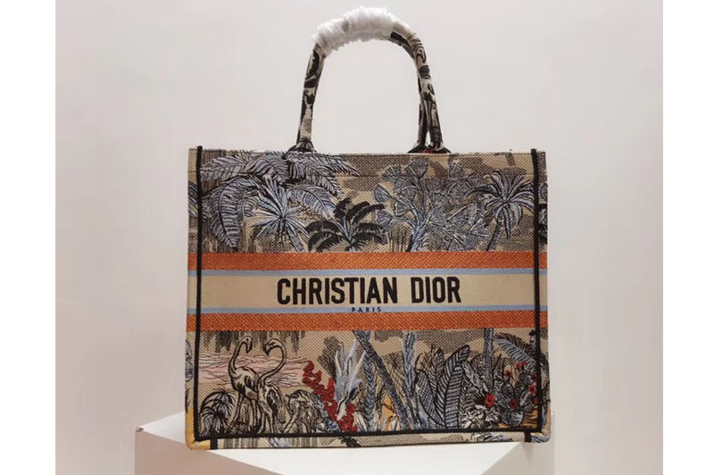Dior M1286 Book Tote 42mm bag in embroidered canvas With a denim blue Toile de Jouy Tropicalia motif