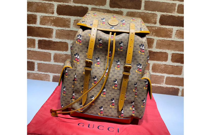 Gucci 603898 Disney x Gucci medium backpack in Beige/ebony mini GG Supreme canvas with Mickey Mouse