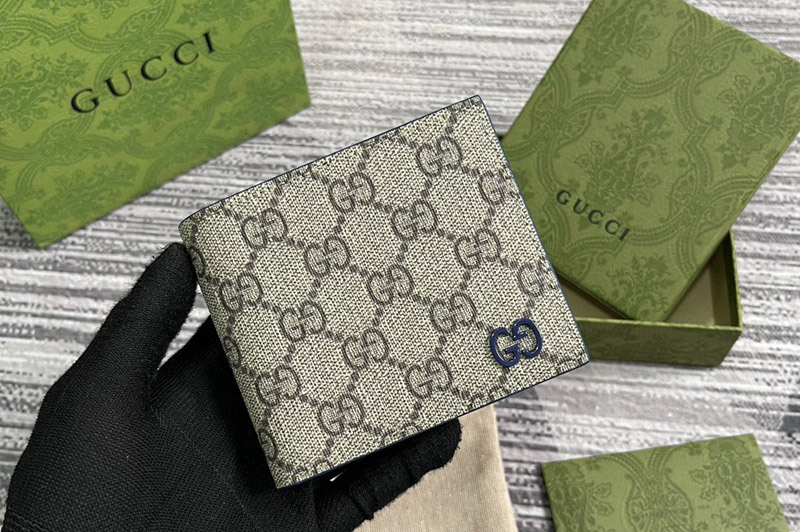 Gucci 768244 bifold wallet with GG detail in Beige and ebony GG Supreme canvas With Blue