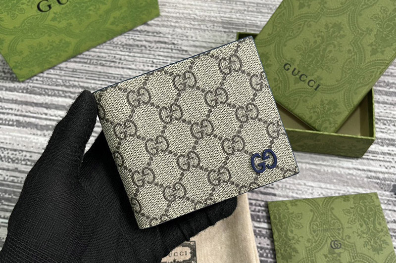 Gucci 768244 bifold wallet with GG detail in Beige and ebony GG Supreme canvas With Blue